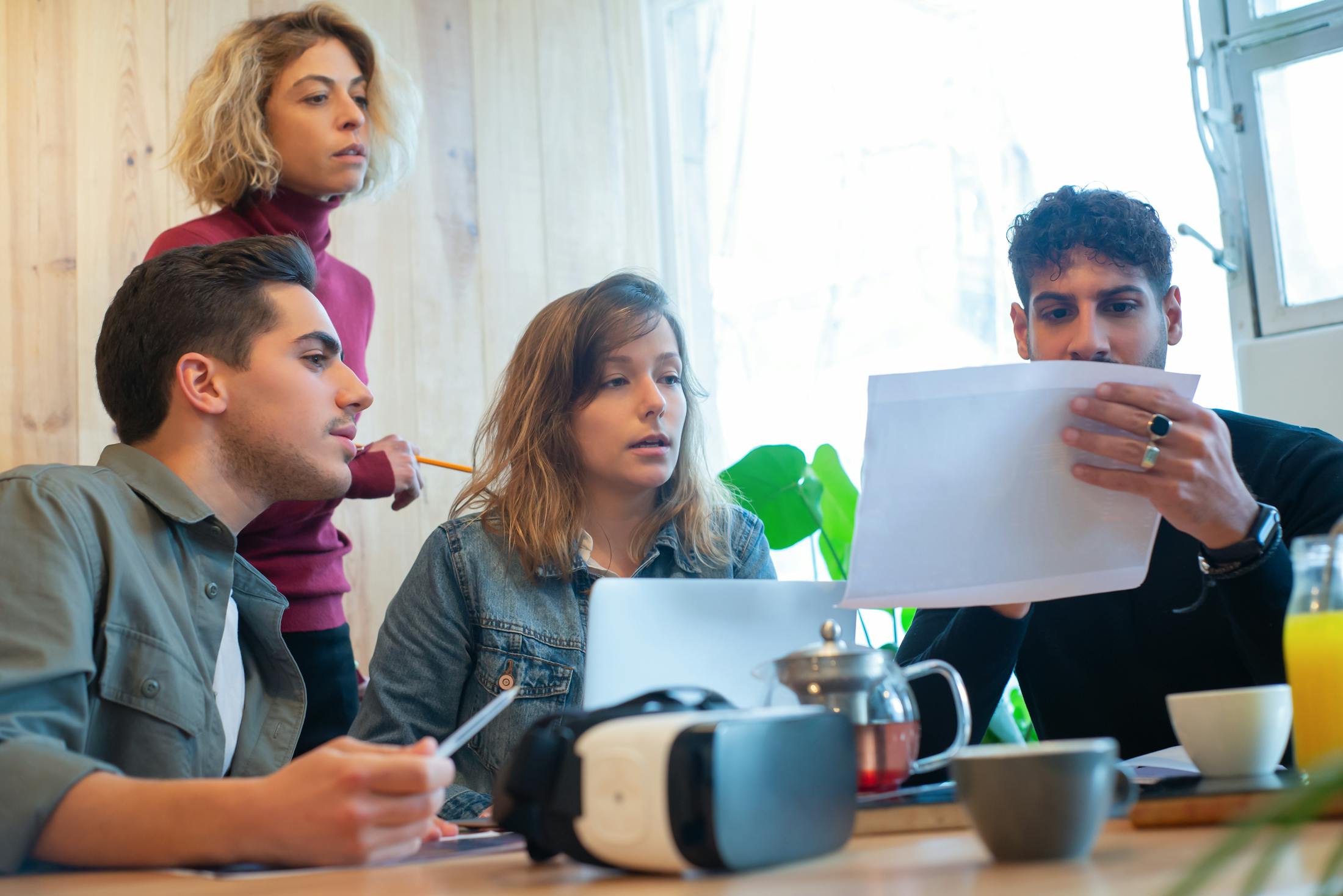 Marketing team reviewing a planning document together